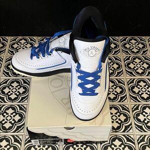 Nike Air Jordan Sneakers - White and Blue Accents